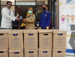 WOM Finance Bagikan Ribuan Multivitamin Lawan Corona